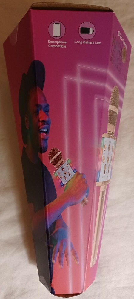 Karaoke Microphone with speaker. USB charging, Bluetooth. With flashing lights.