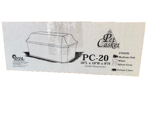 The Pet Casket deluxe lined, Medium Oak finish, in original box.
