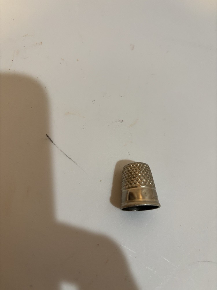 Five thimbles. Sizes 8, 9, 9,10,11