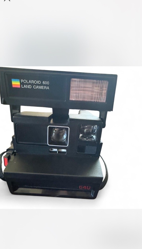 Vintage Polaroid 600 black camera with strap