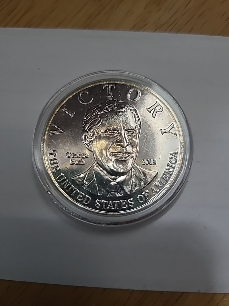 Bush Hussein Victory Coin