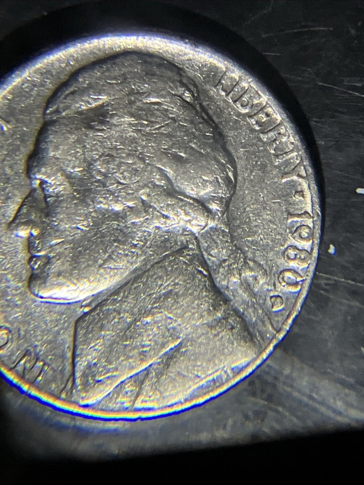 1980 D Nickle Struck Through Grease