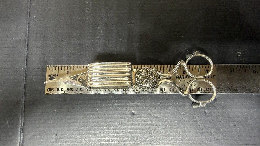 Antique Rogers Candle Snuffer