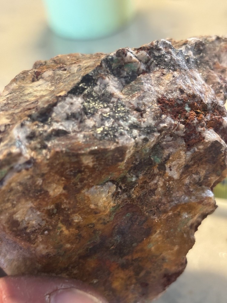 highly mineralized gold ore on quartz