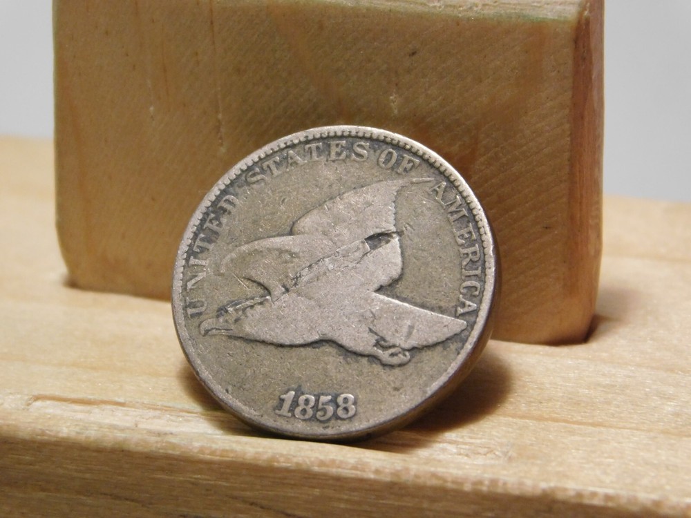 1858 Flying Eagle cent error, lamination across the center