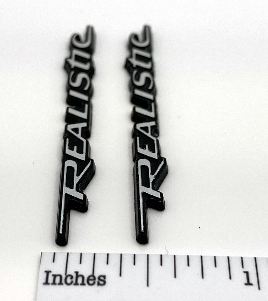 Realistic Minimus 7W Speaker Badge Custom Incised Laminated Plastic Pair Silver