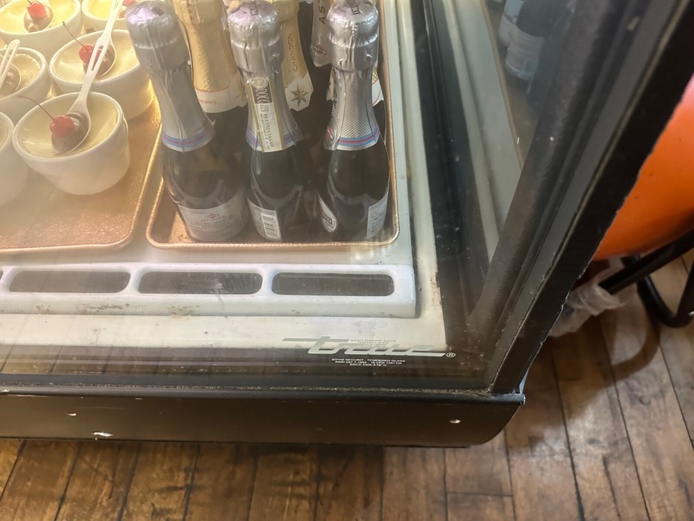 true curved glass display merchandiser