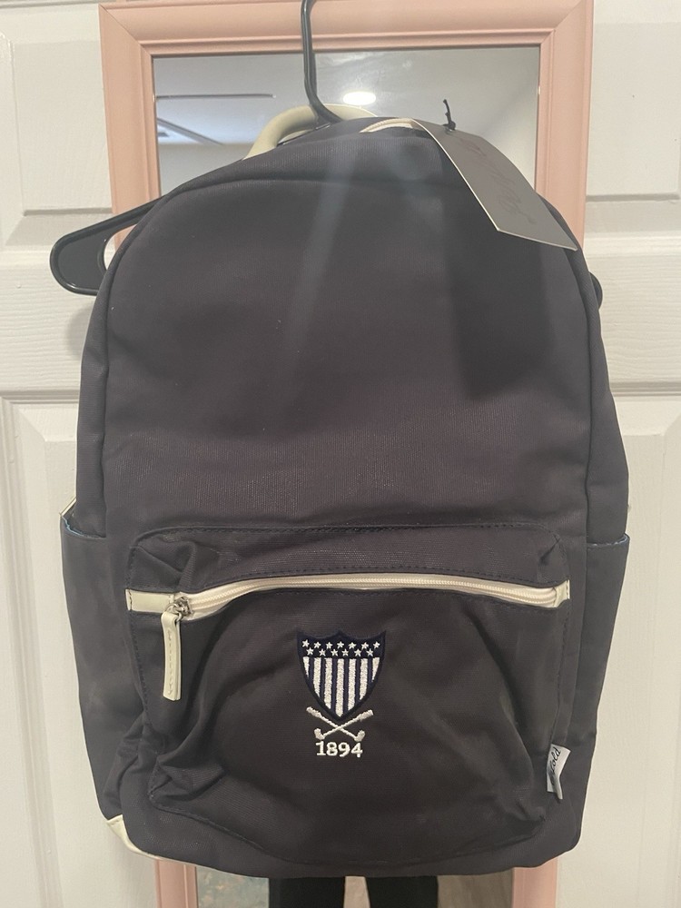 Penfold Heritage Backpack" and "USGA 1894 Shield"