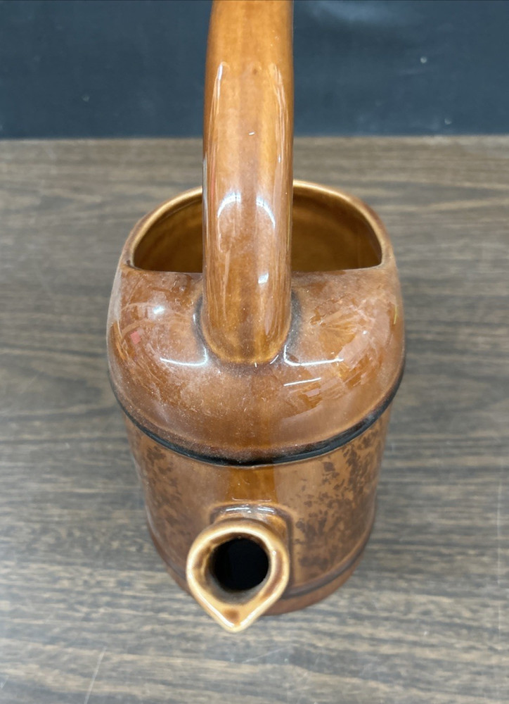 Multi shade brown ceramic circular handle decorative planter 9"h., 11 1/2"w
