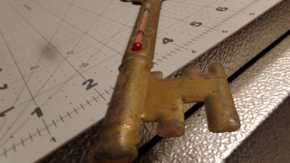 VINTAGE 9" METAL SKELETON KEY THERMOMETER.