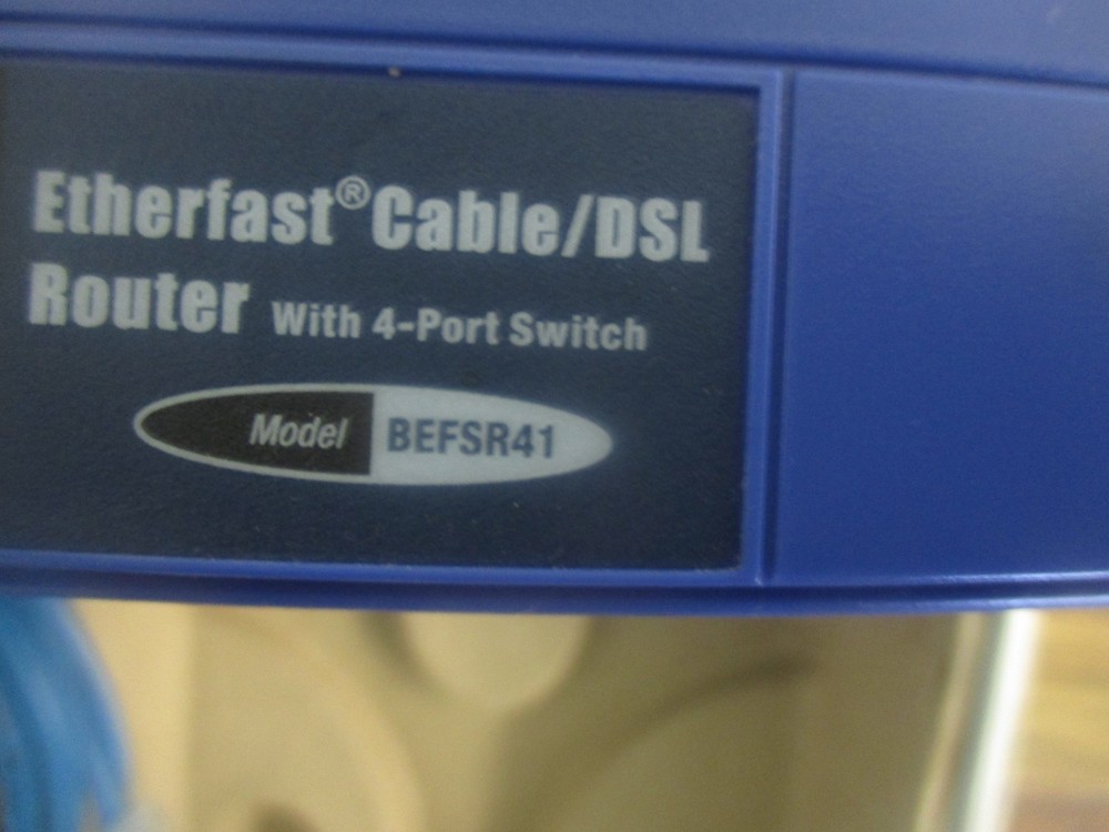 Linksys: BEFSR41 Ethernet Cable/DSL Router with 4-Port Switch. Includes Adptr