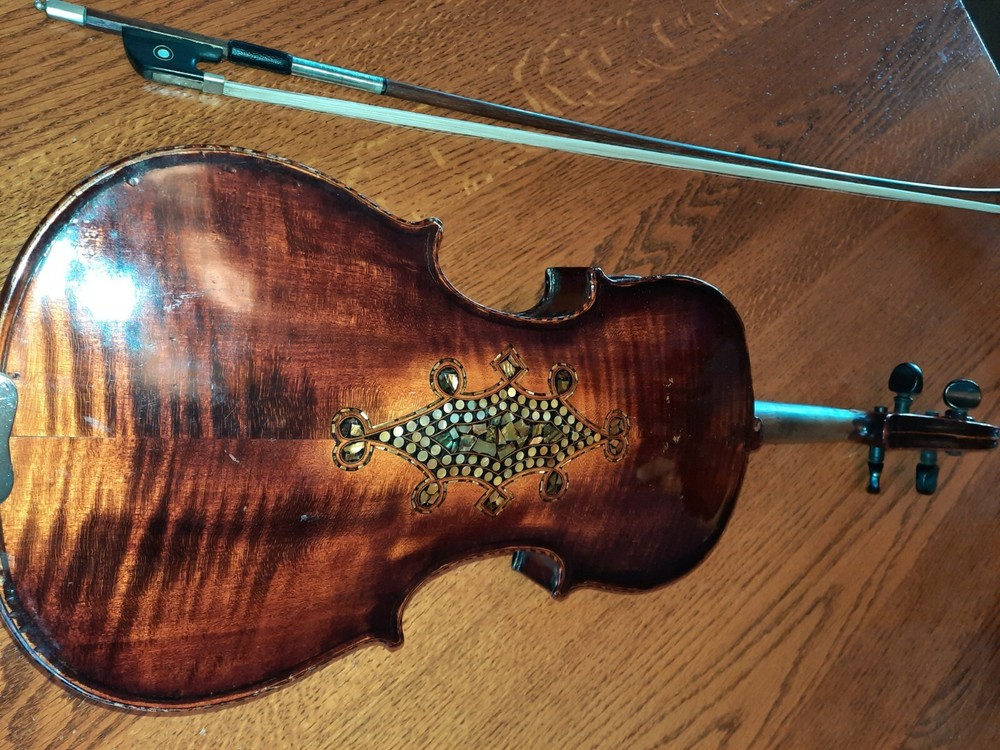 100 year old German violin with a vuillaume bow