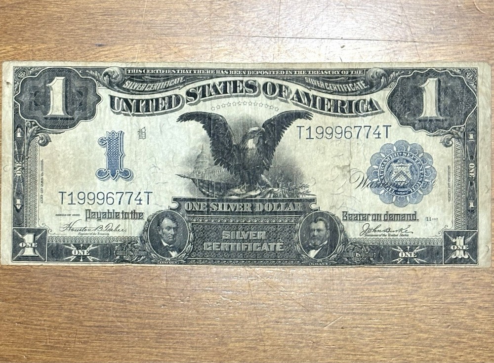 1899 $1 Large Size Black Eagle ( Triple 9’s)