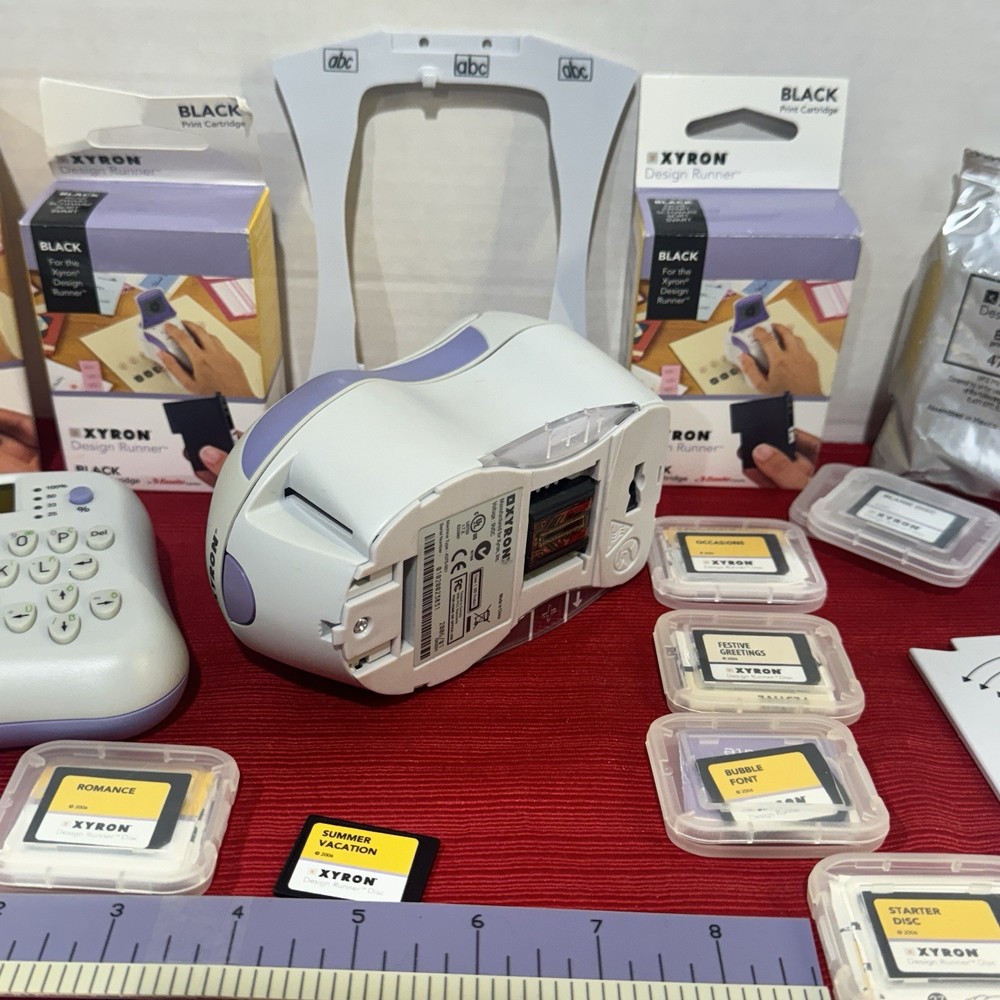 Xyron Design Runner Cordless Handheld Printer, Disc Maker, 6 Inks, 9 Design Disc