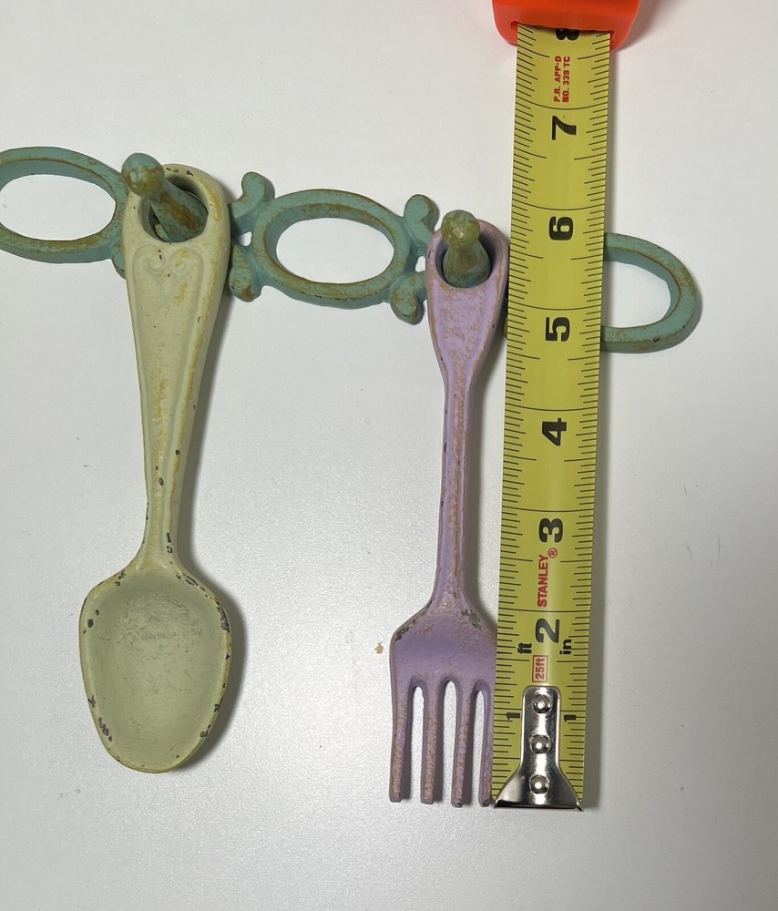 Cast iron kitchen decor with hanger