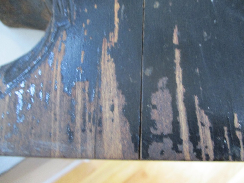 Antique painted black corbel.