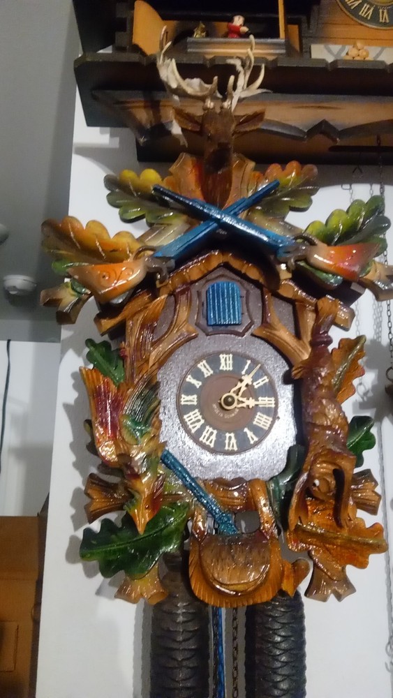 Blackforest Blue Guns Cuckoo Clock Eight Day.