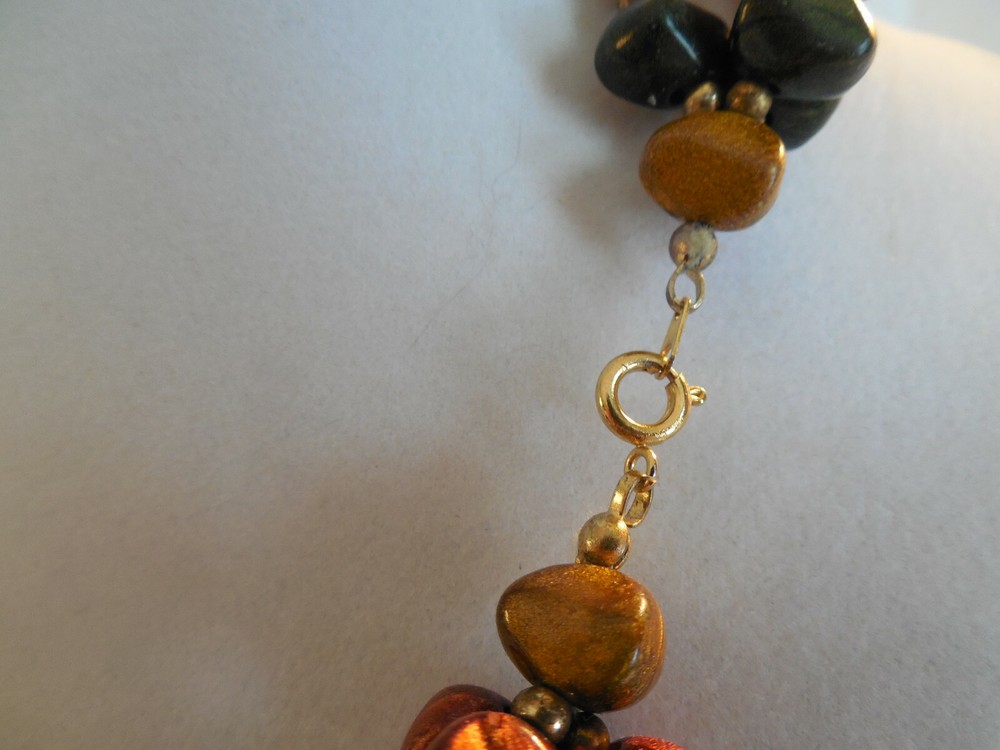 Earth tones three strand plastic beaded necklace 18"