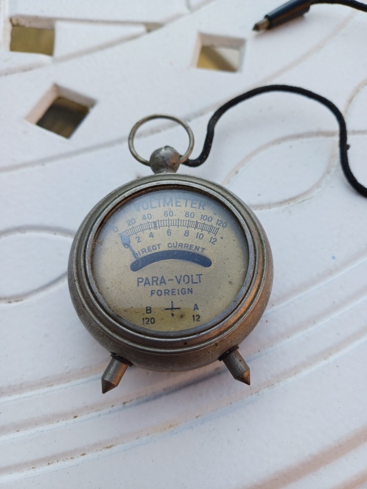 Vintage pocket watch style volt meter
