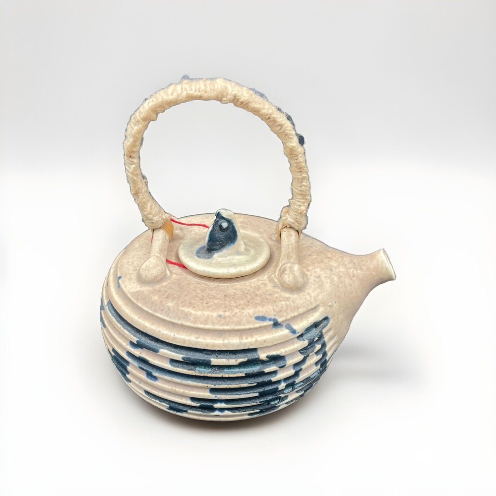 Small Tea Pot Blue & White Pottery w/ Yarn Handle.