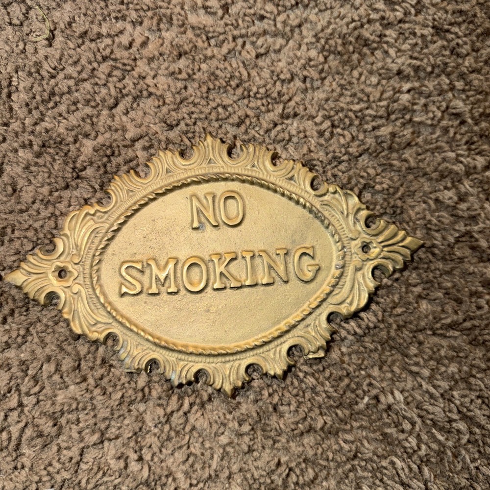 cast iron NO smoking sign