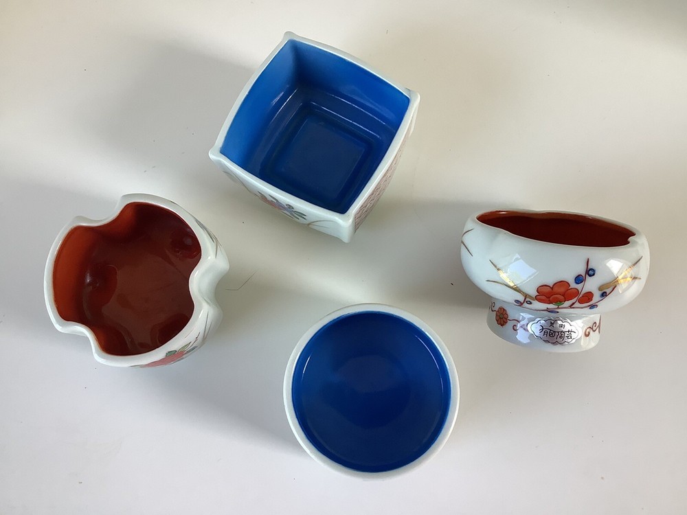 Four mini Asian floral decorated planters