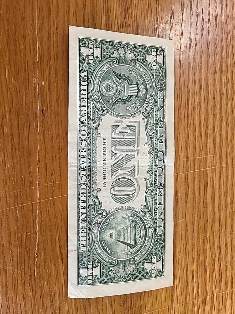 14876190. 1999 $1 FRN Print Shift Error. Low Seal.