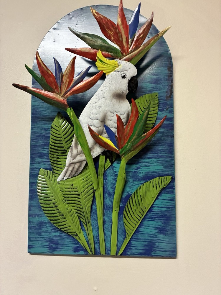 Parrot Perched On Green