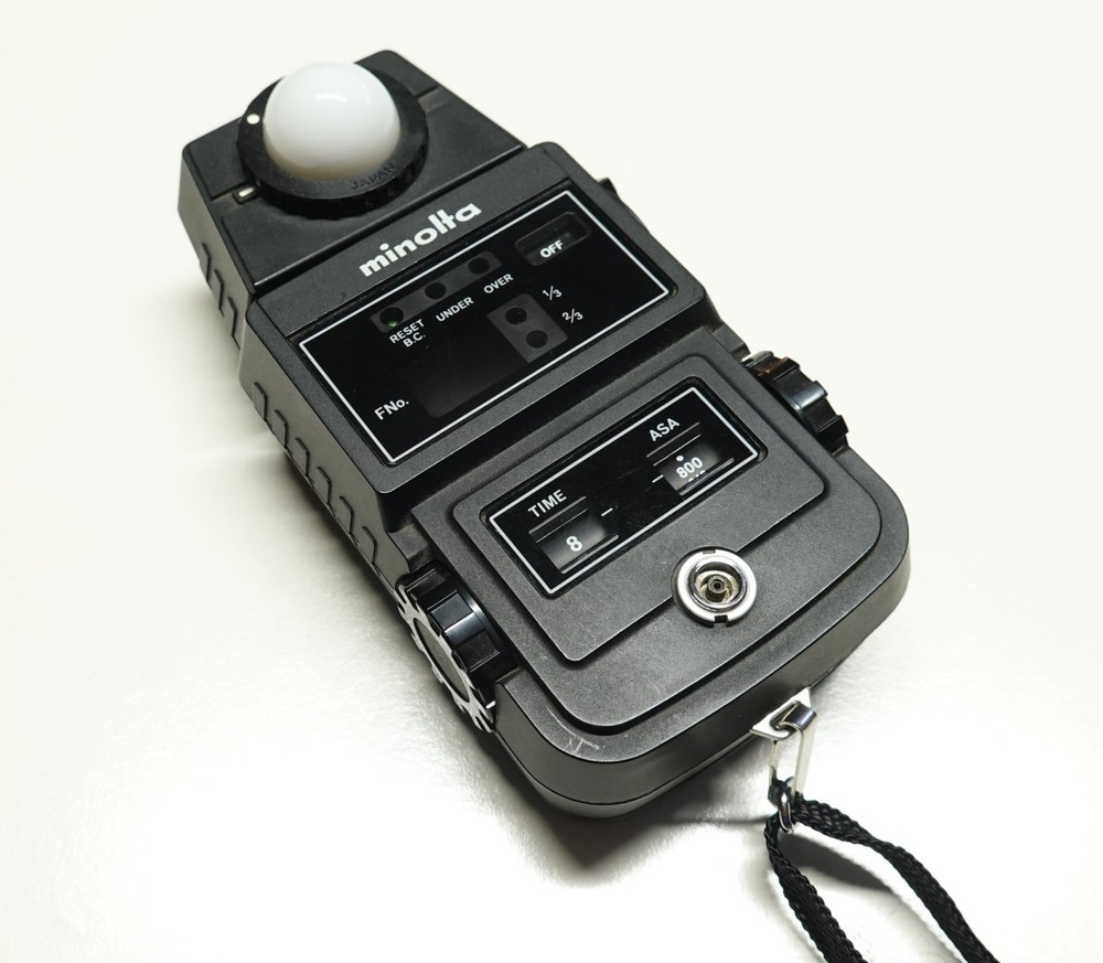 Minolta flash meter II with bag and attachment.