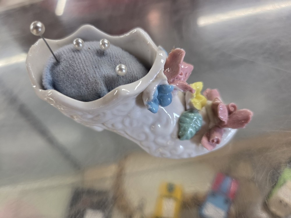 VINTAGE PORCELAIN BOOT PUSH PIN CUSHION.