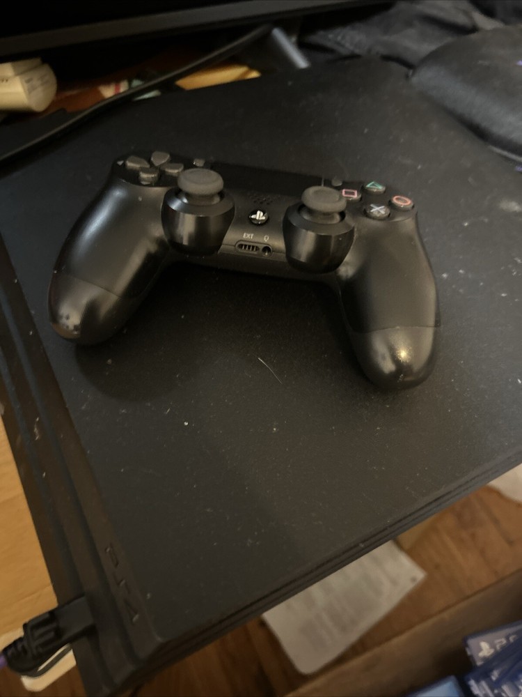 Comes With The Cables, Controller, And Works Completely Fine. Has No Issues