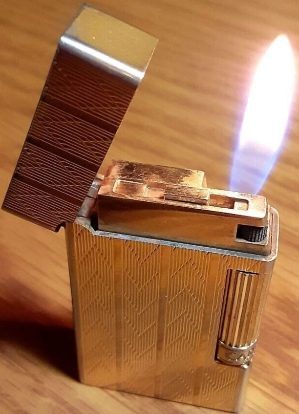 Working Caran d'Ache gas lighter gold without box