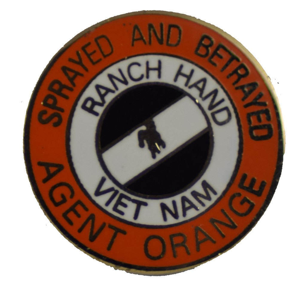 AGENT ORANGE SPRAYED HAT PIN