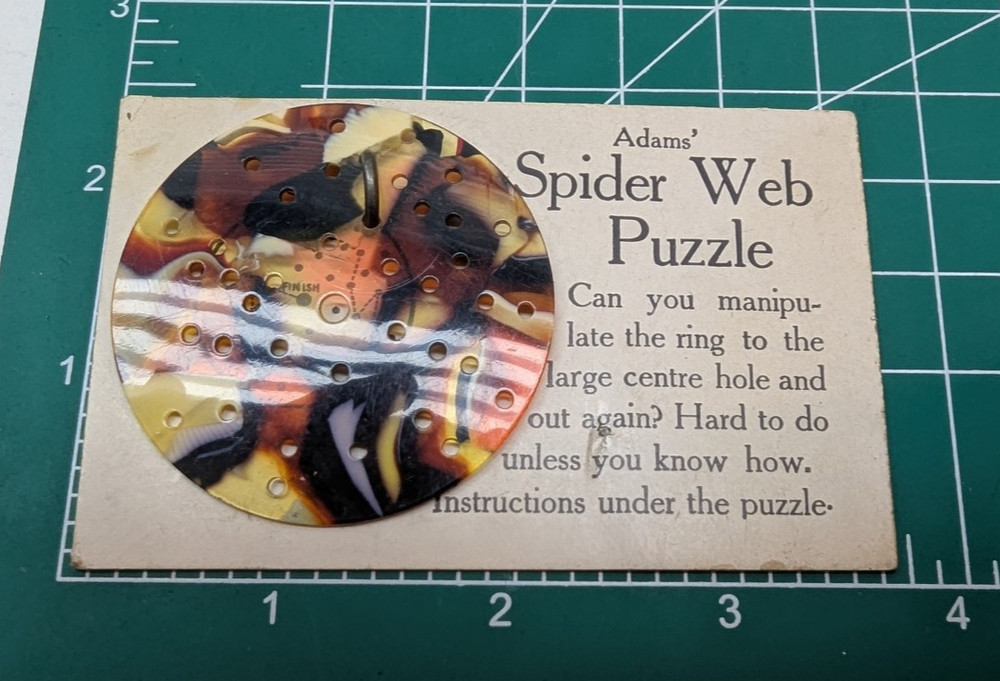 Vintage Adams' Spider Web Puzzle Plastic Gloss Round
