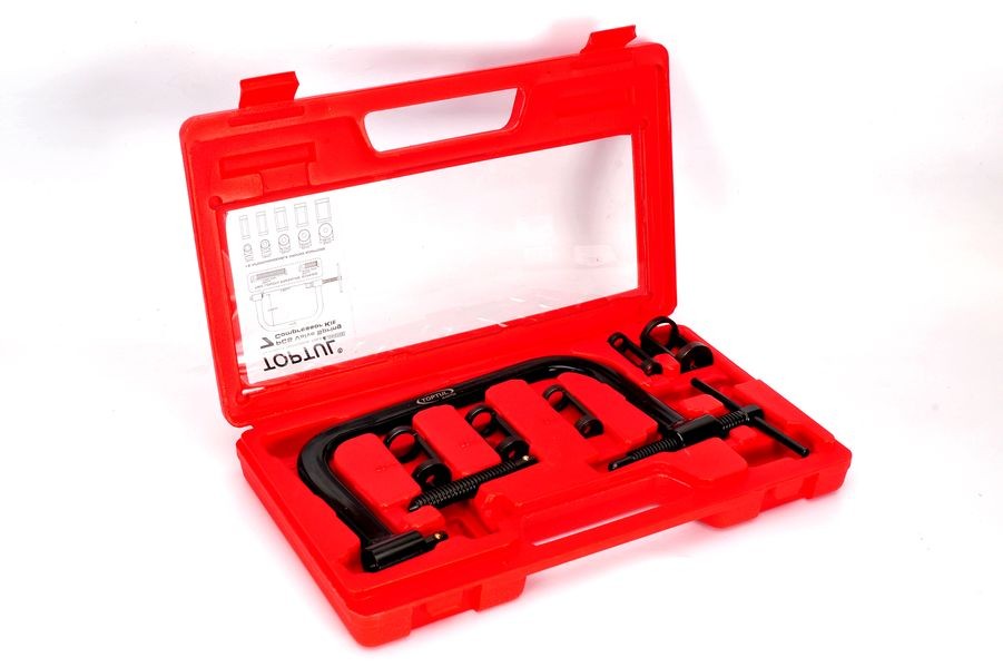 Valve spring release press