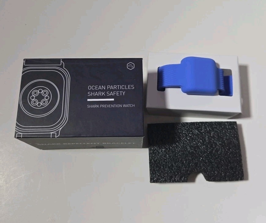 Ocean Particles Shark Repellent Bracelet, Blue Opened Box