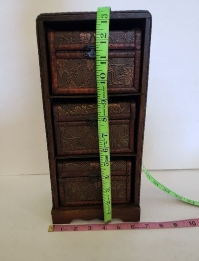3 Small Storage Trunks in Shelving Unit