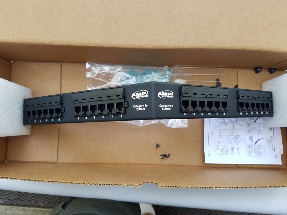 AMP 1499602-2 SL Series Patch Panel Cat5E Unshielded 24-Port Angled 1U