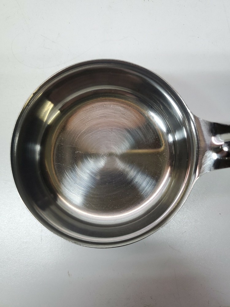 Winco - FPS-3 - 3 oz Beige Solid Portion Spoon