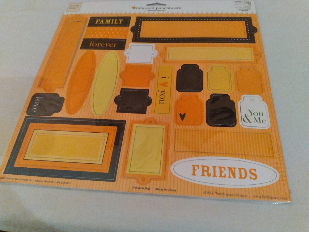 FISKARS' HEIDI GRACE EMBOSSED PUNCHBOARD ADHESIVE ADD-ONS