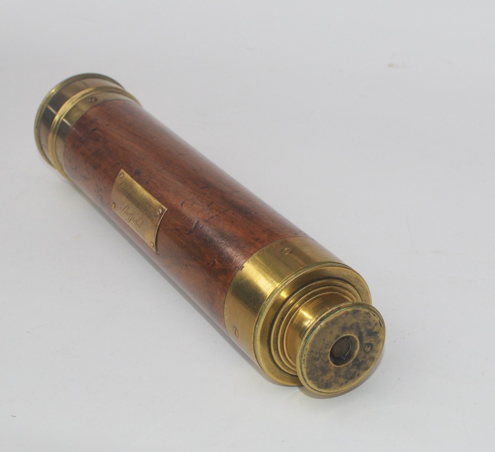 Four draw signed telescope.