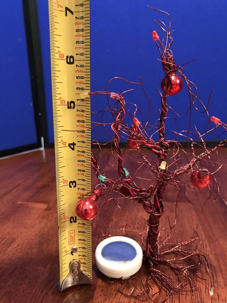 Twisted Red Wire Christmas Tree Plays Music