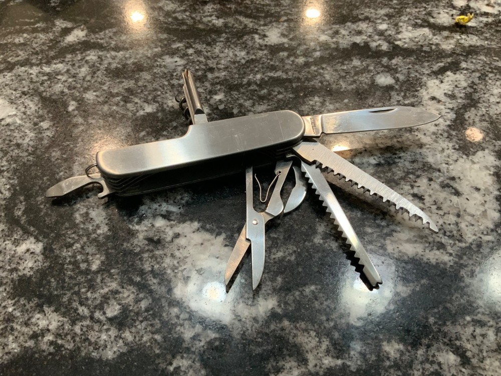 Pre Owned Pocket knife Army style 8 function Multi Tool used nice