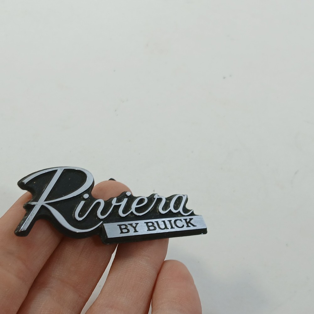 RIVIERA BY BUICK CIRCA '80'S DASH PLASTIC EMBLEM