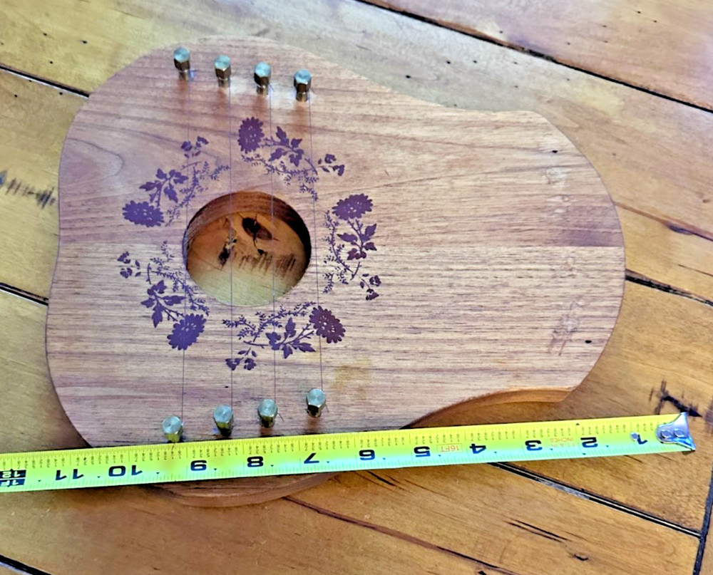 Rustic Floral Wooden String Instrument