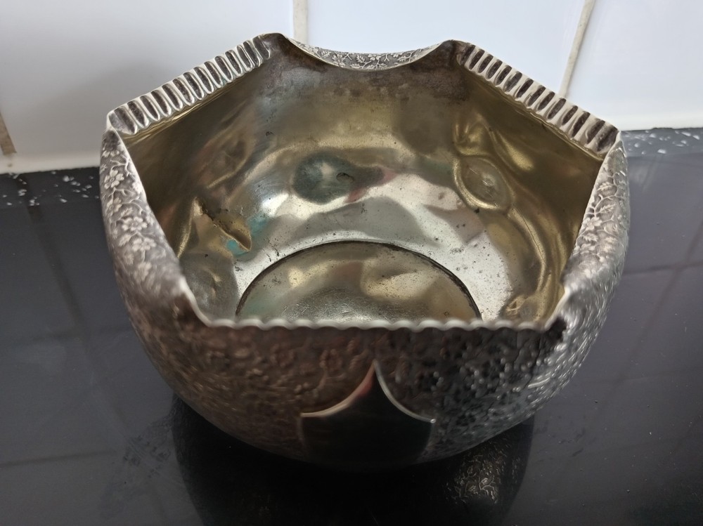 Silver plated very ornate rose bowl.