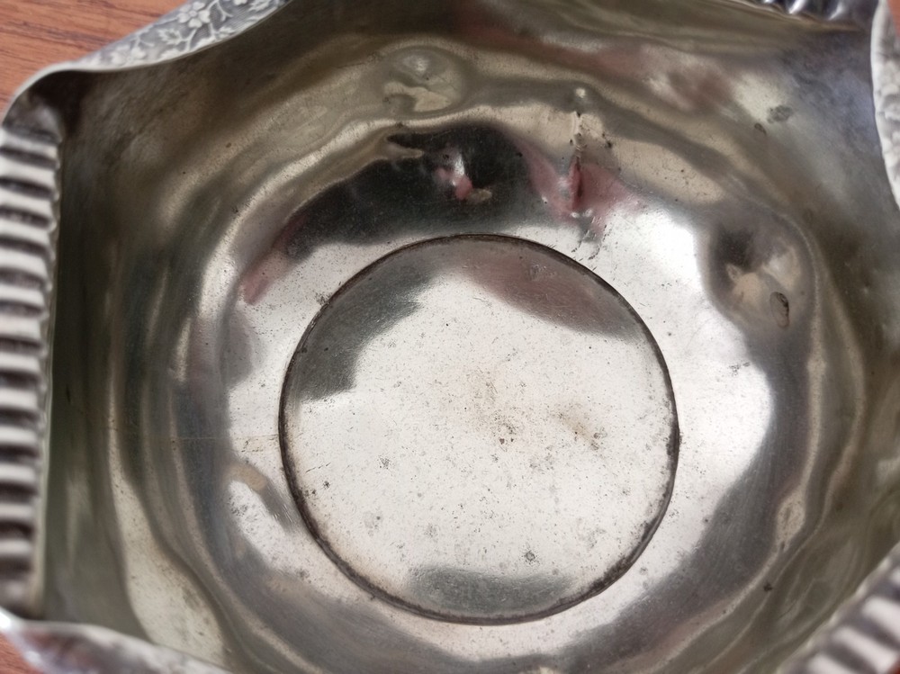 Silver plated very ornate rose bowl.
