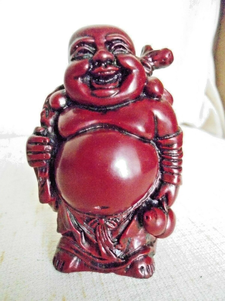 CHINESE RED POLY RESIN BUDDHA MAN