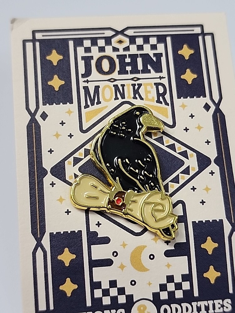 Black Bird with a Scroll Lapel Pin