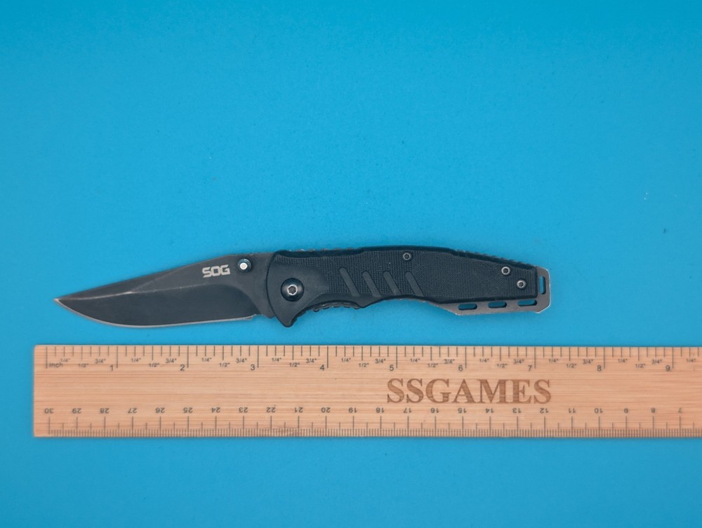 SOG Salute Pocket Knife Lockback Plain Edge Blade!